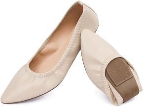 Beige ballet flats with elastic trim.
