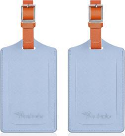 Two blue luggage tags with brown straps.